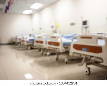 Blur Image Of Empty Intensive Care Bed In Emergency Room, Abstract Blur Of Hospital Patient Ward Or ICU Intensive Care Unit, Hospital Concept.