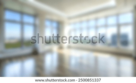 Blur image of empty room with sofa, modern livingroom interior with light and shadow at big window, blurred nature background for advertisement use. blank hall room.