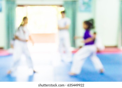 Blur Image Of Fighting In Taekwondo Class.