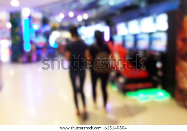 Blur\
image of game zone in the mall, use for\
background.