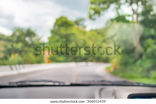 blur image of inside cars to see the\
road  with bokeh lights for background\
usage.