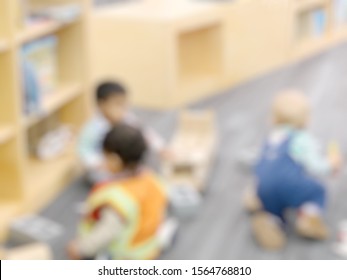 Blur Image Of Kids, Baby, Toddler Are Playing. Friend, Friendship, Play Date, Hang Out, Meet Up. Concept For News, Mom Story, Babysitting. In Library