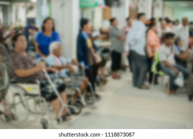 Blur image of patients in the hospital waiting to see doctor and treatment. 
