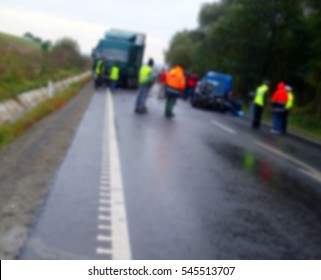 Blur Image With Scene Of An Accident Between A Truck And A Car