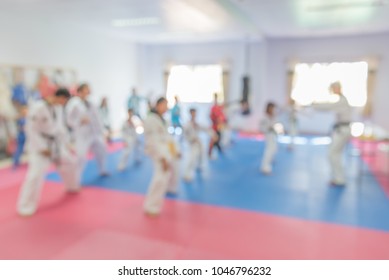 Blur Image Of Taekwondo Training Class With Teacher And Student For Background.