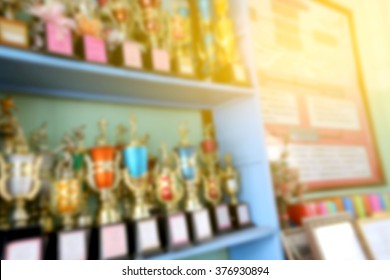 Blur Image Of Trophy On Shelf