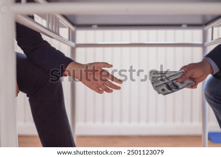 Blur image,corruption on officials in order to obtain items and projects that they want as an offense by giving money for corruption. idea of combating and preventing corruption by government official