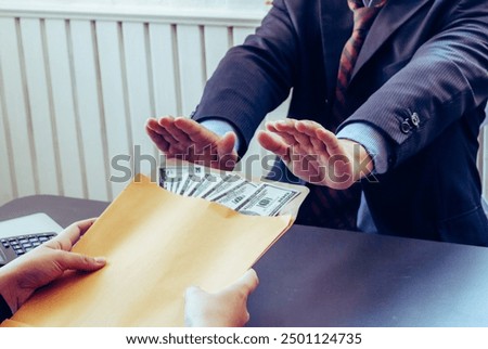 Blur image,corruption on officials in order to obtain items and projects that they want as an offense by giving money for corruption. idea of combating and preventing corruption by government official