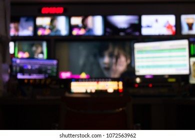 Blur Images Of Multiple Television Broadcast. In Master Control Room.