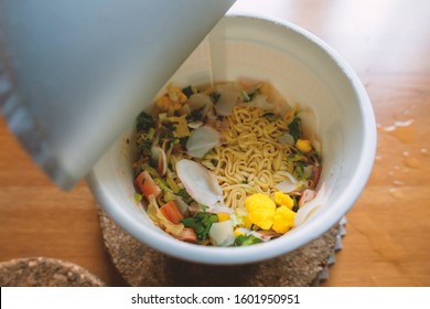 Blur Instant Noodle In A Cup On Table