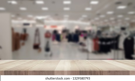 Blur Interior of modern fashion shop. Front View Balcony Table