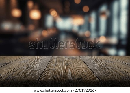 blur interior restaurant or cafe and empty wooden table top for product.