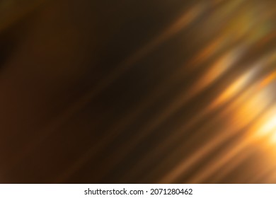 Blur light overlay. Lens flare rays. Defocused glare. Old film flash leak. Bokeh golden orange color beam design glow on dark black abstract background. - Shutterstock ID 2071280462