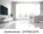 Blur living room at home with morning sunlight at big window for background usage. blur interior background concept. white, britht tone.
