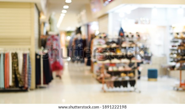 Blur mall and shop background, Store in
shopping mall with bokeh light
background