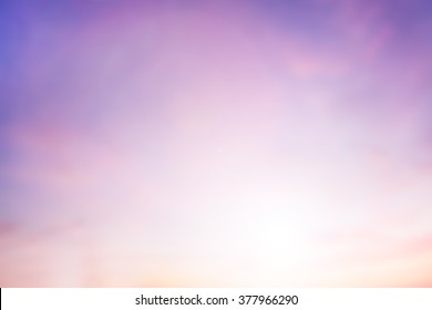 The blur pastels gradient sunset background soft nature sunrise peaceful morning beach outdoor  heavenly mind view at resort deck touching sunshine  sky summer clouds 