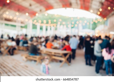 Blur People Picnic In A Public Park With Family Or Friends. Blurred Picnic Background