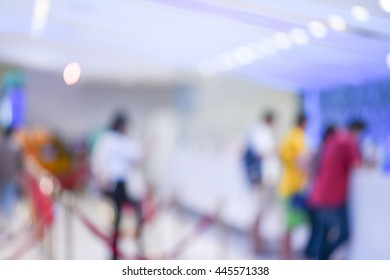 Blur People Wait In Line Purchase Movie Ticket At Counter In Theater Complex Cinema - Blurred Background