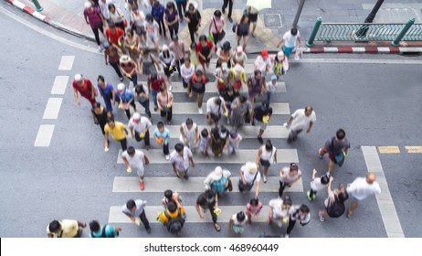 Blur People Walking In The Crosswalk Business Street City At The Rush Hour (Aerial Photo, Top View)