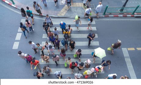 Blur People Walking In The Crosswalk Business Street City At The Rush Hour (Aerial Photo, Top View)