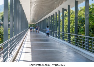 Blur ,People Walking Through The Hospital Corridor.