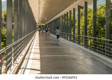 Blur ,People Walking Through The Hospital Corridor.