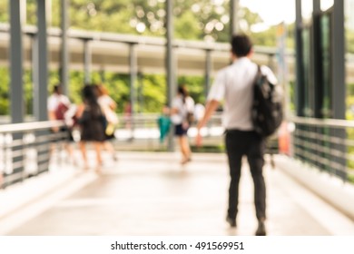 Blur ,People Walking Through The Hospital Corridor.