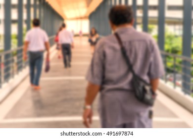 Blur, People Walking Through The Hospital Corridor.