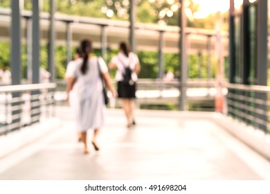 Blur, People Walking Through The Hospital Corridor.