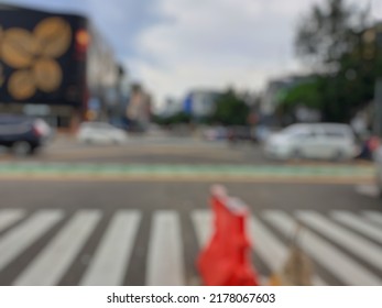 Blur photo of an intersection in Jakarta - Shutterstock ID 2178067603