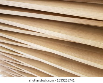 Blur photo of Medium-density fiberboard or call another name is mdf and stacked several layers and overlapping for Dimensional view and beauty