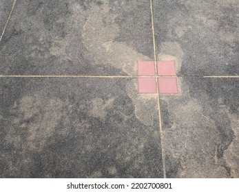 Blur Photo Of Mixed Colors Exposed Aggregate Finish Floor With Pink Square Tiles