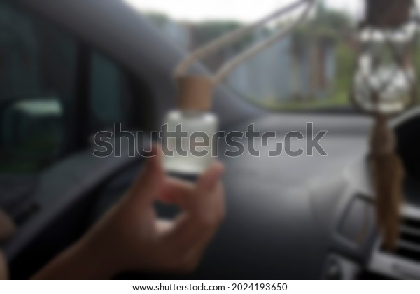 blur\
photo of perfume bottles as interior\
accessories