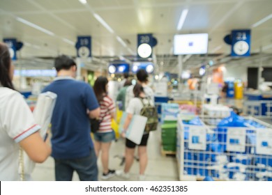 Blur Picture Background  Of Customer Queue For Pay Money At Shopping Counter  Cashier In Furniture Mall 
