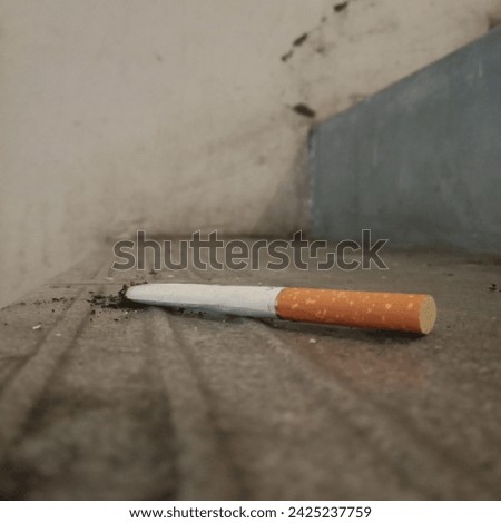 blur picture cigarette butts on the stairs