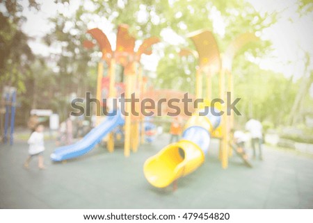 Blur playground in park abstract background, with sunlight effect