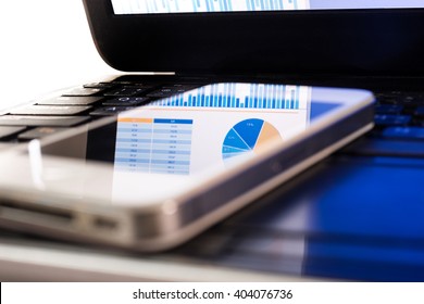 Blur of reflect business graph on smartphone.business  analysis/financial concept