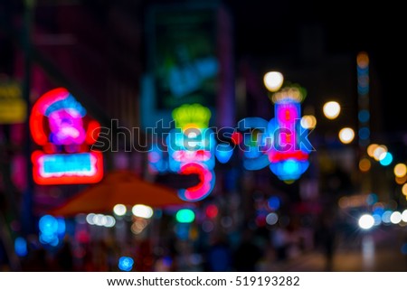 Blur shot of Neon signs of famous blues clubs on Beale street 