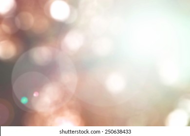 Blur Sky Background With Nature Glowing Sun Light Flare And Bokeh In Vintage Red Orange Brown Color 