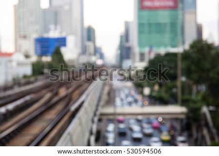 Blur of sky train rail, traffic jam in Bangkok, Thailand.