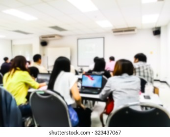 Blur Student During Study Or Lecture And Quiz Or Exams From Teacher Or Professor In Classroom With Notebook In Master Degree Of Industrial Management Programs Or MBA At Thailand University 