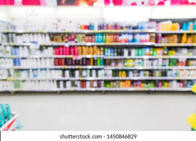 Blur Supermarket Aisle With Shampoo Product On The Shelf Background,Many Shampoo Brand Sale On The Shelf In A Supermarket, As Blurred Effect Background, Hair Shampoo Section.