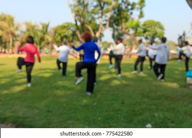 Blur Tai Chi Group Exercise In Morning Sunrise