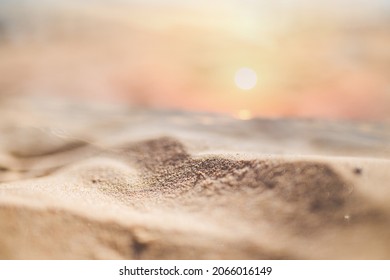 Blur Tropical Sunset Beach With Bokeh Sun Light Wave Abstract Background.