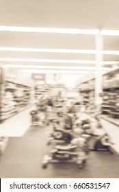 Blur Variety Of Fitness Equipment On Display At Sporting Goods Store In Houston, Texas, US. Defocused Pile Of Dumbbells, Weight, Strength Training, Stepper, Cardio Machines, Gym Service. Vintage Tone.