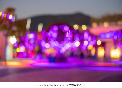 Blur view of theme park at night