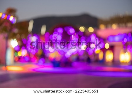 Blur view of theme park at night