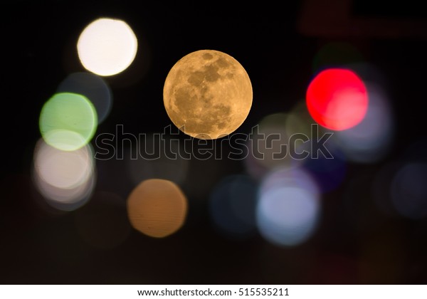 blur vision\
of colorful bokeh and  supper moon\
.