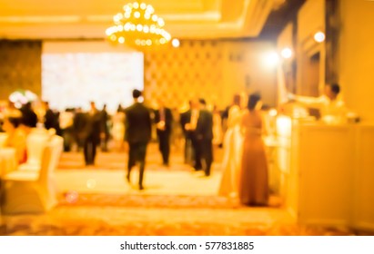 Blur Waiter On Gala Dinner Service In Hotel Ballroom