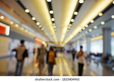 Blur walk way with bokeh lighting yellow tone background.                                - Powered by Shutterstock